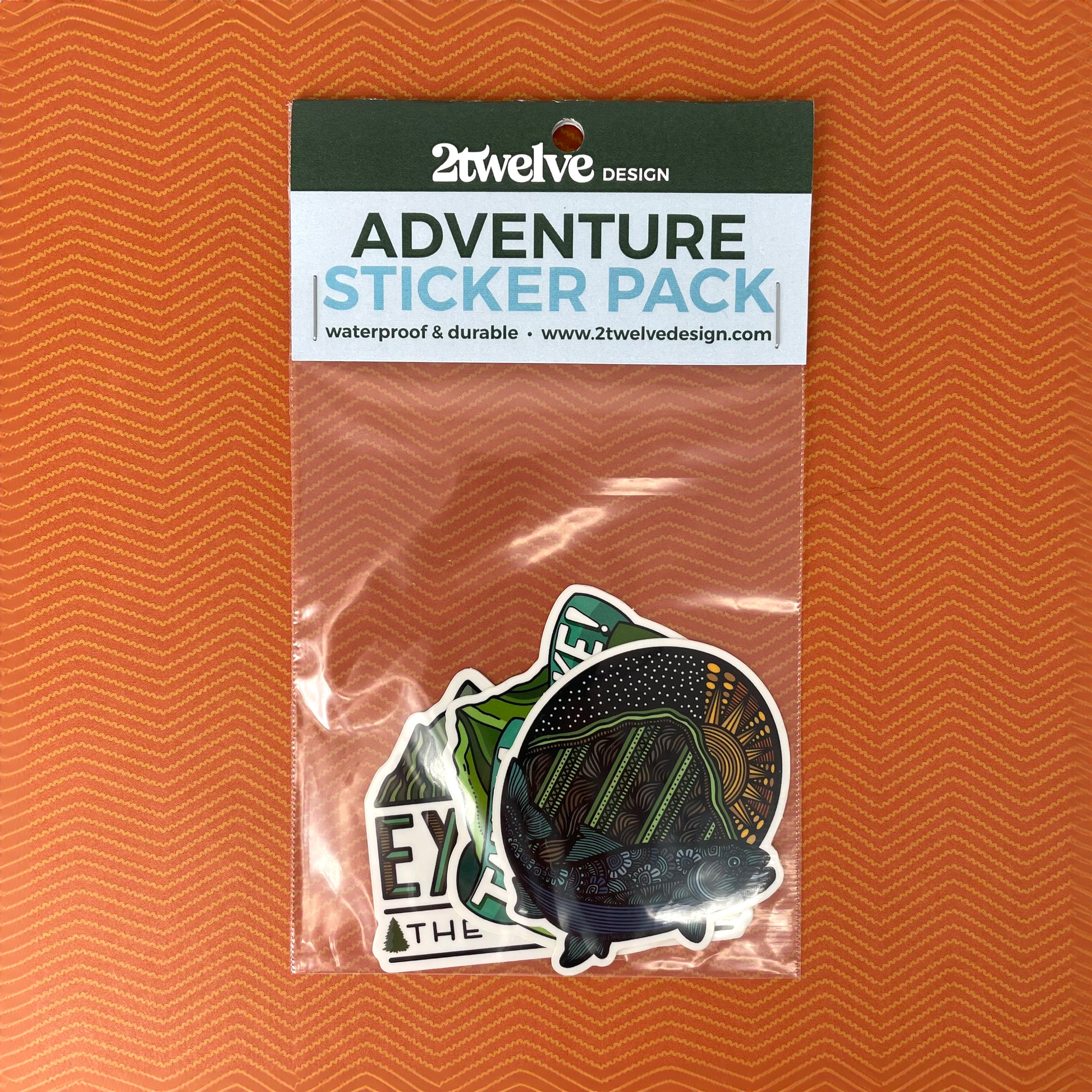 Packaged Adventure sticker set with label on a textured brown background.