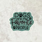 A sticker of "Dogs Are My Favorite People" quote on a sage green background. Laying flat on a white texture background.
